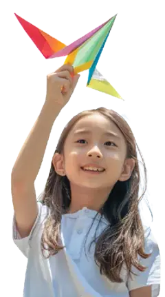 asian girl holding a paper plane